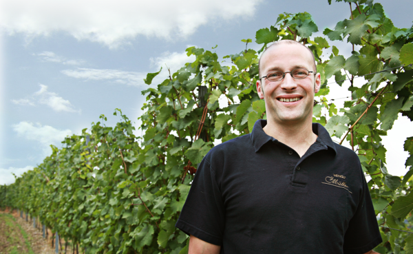 Winemaker Johannes Müller smiles for the camera in his vineyard © Koblenz-Touristik GmbH Winemaker Johannes Müller smiles for the camera in his vineyard © Koblenz-Touristik GmbH